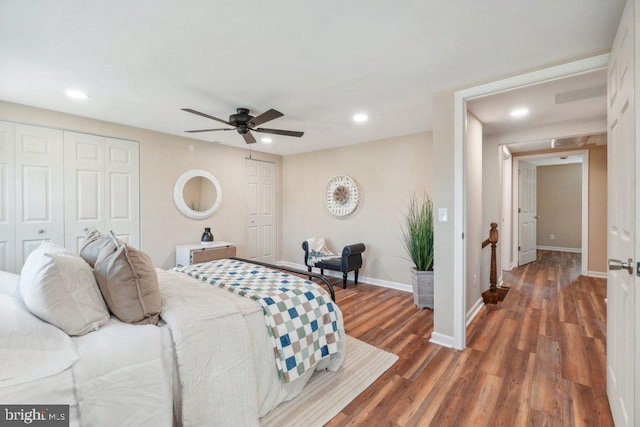 bedroom featuring ceiling fan and dark hardwood / wood-style floors