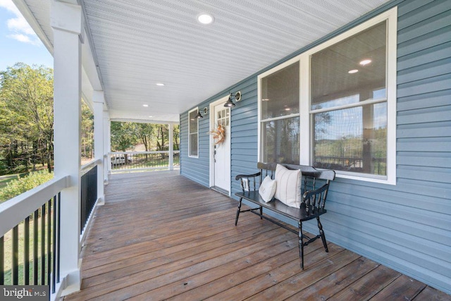 wooden terrace with covered porch