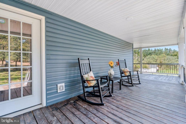 wooden terrace with covered porch