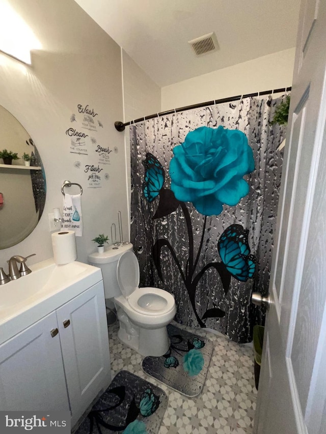 full bath featuring visible vents, curtained shower, toilet, tile patterned floors, and vanity