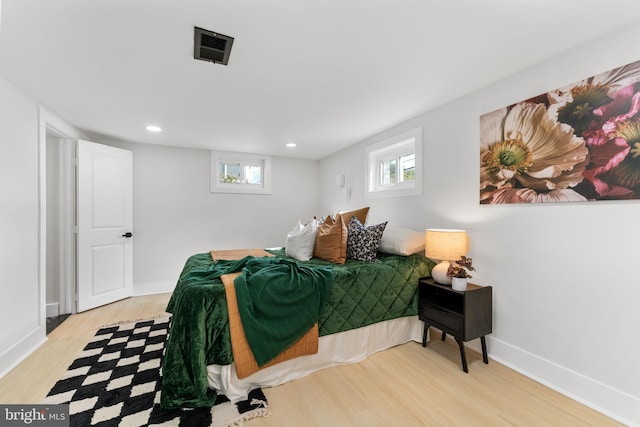 bedroom with light wood-type flooring