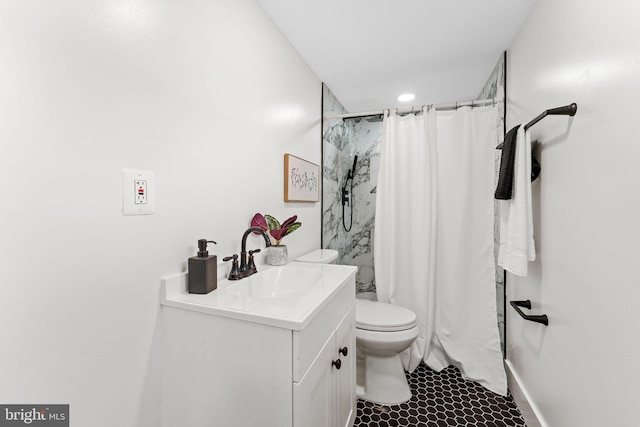 bathroom featuring curtained shower, tile patterned flooring, toilet, and vanity