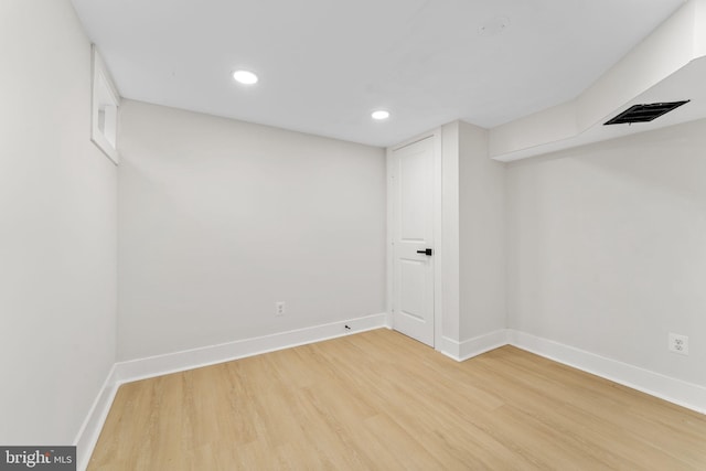 basement with wood-type flooring