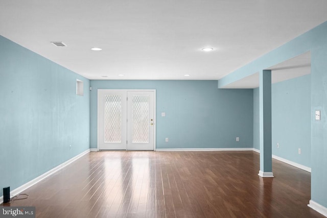 interior space with recessed lighting, visible vents, baseboards, and wood finished floors