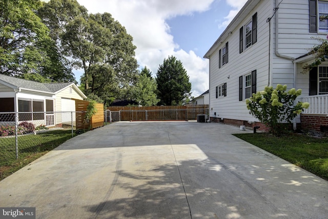 view of property exterior with central AC