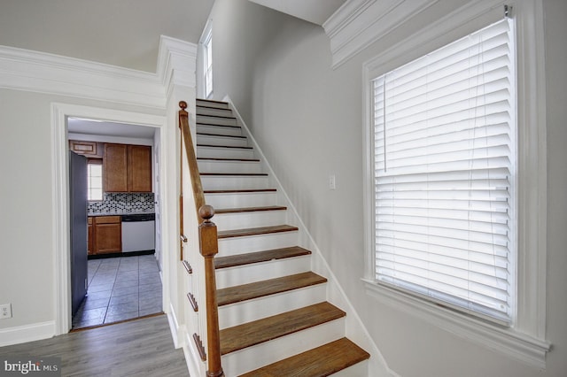 staircase featuring hardwood / wood-style flooring