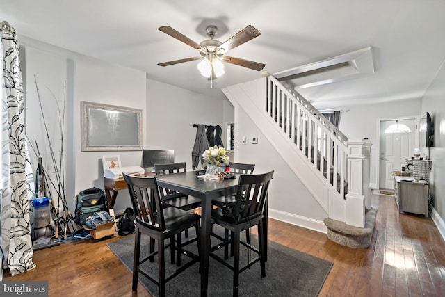 dining room featuring ceiling fan and dark hardwood / wood-style floors