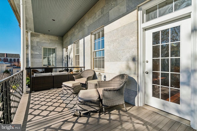 balcony with an outdoor hangout area