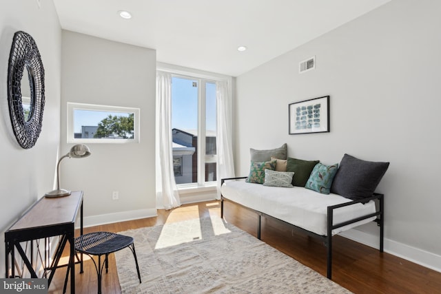 living room with light hardwood / wood-style flooring