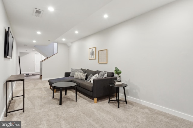 living room featuring light colored carpet