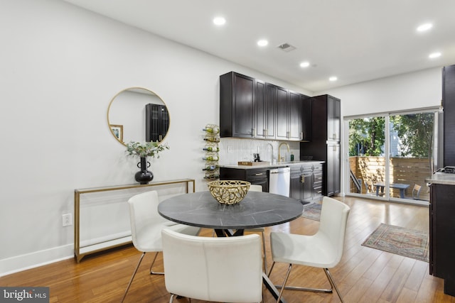 dining room featuring light hardwood / wood-style floors