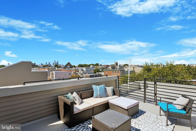 view of patio / terrace featuring outdoor lounge area and a balcony