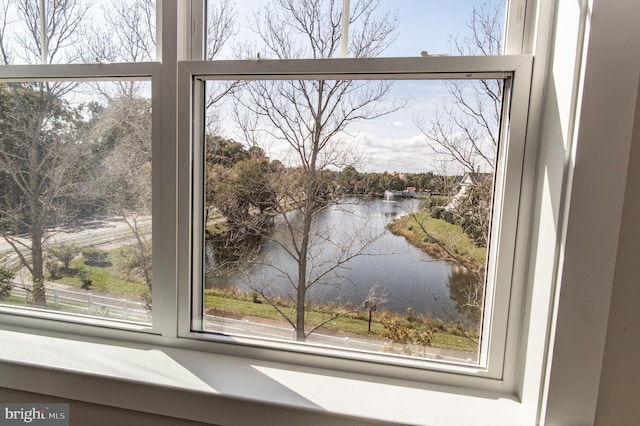 interior details featuring a water view