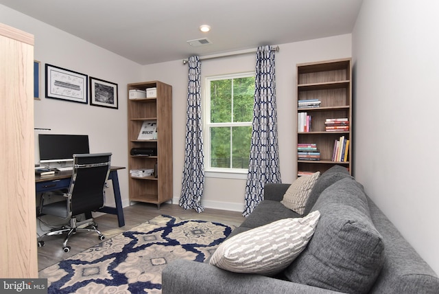 home office featuring hardwood / wood-style flooring