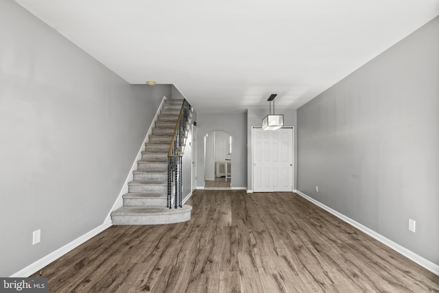 entryway with wood-type flooring