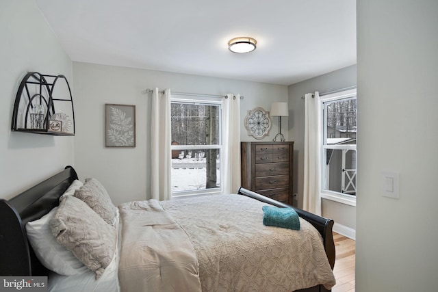 bedroom with light hardwood / wood-style flooring