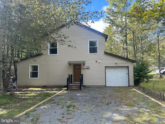 view of front of home with a garage