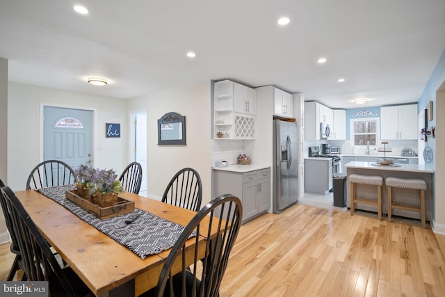 dining room featuring light hardwood / wood-style floors