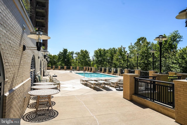 community pool featuring a patio