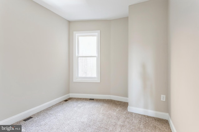 view of carpeted spare room