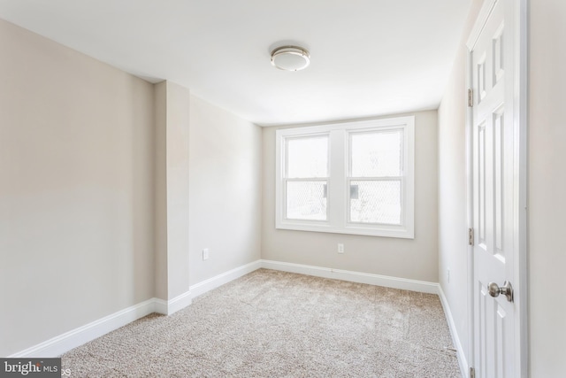 view of carpeted spare room