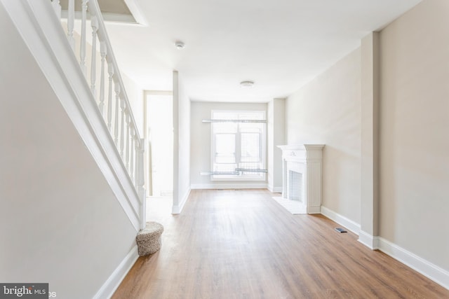 hall featuring hardwood / wood-style flooring