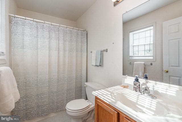 bathroom featuring tile patterned flooring, vanity, toilet, and a shower with shower curtain