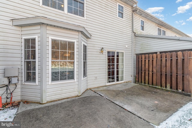 back of property featuring a patio area