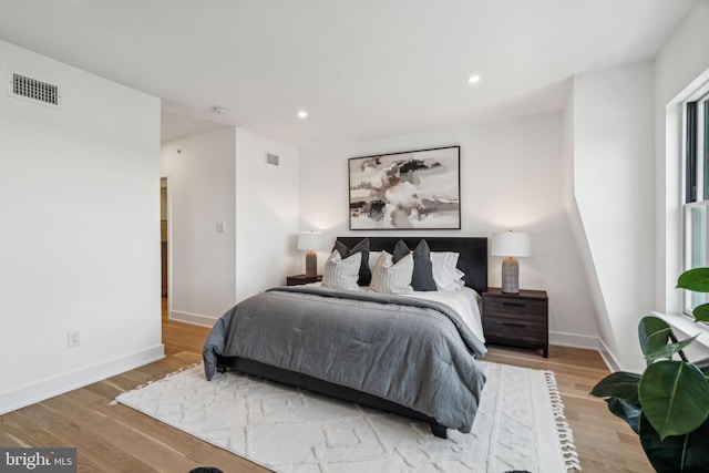 bedroom featuring light hardwood / wood-style flooring