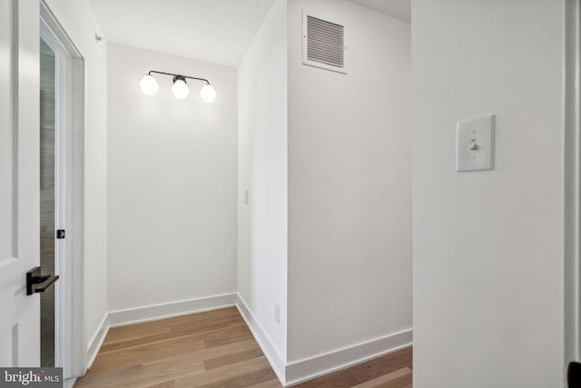 hallway featuring light wood-type flooring