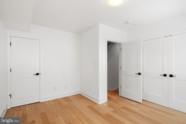 unfurnished bedroom featuring light hardwood / wood-style floors