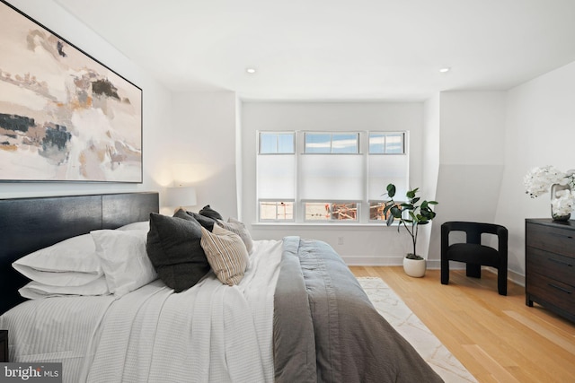 bedroom with light wood-type flooring