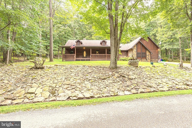 view of front of property featuring a deck