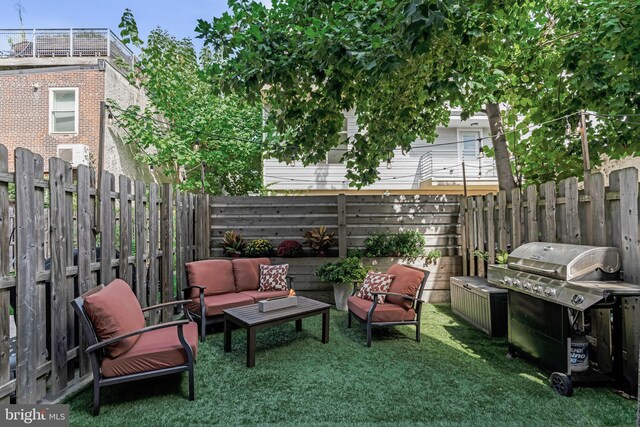 view of patio featuring grilling area and an outdoor living space