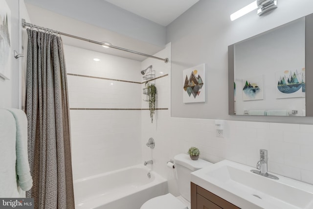 full bathroom featuring toilet, vanity, backsplash, shower / bathtub combination with curtain, and tile walls