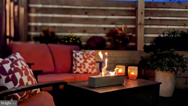 view of patio / terrace with a fire pit