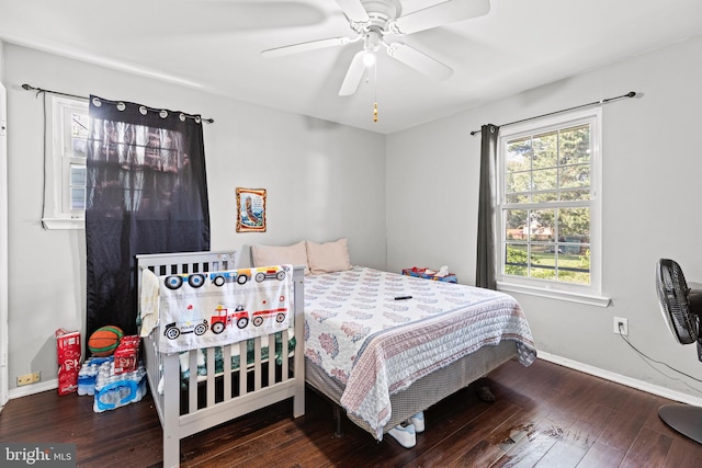 5120 Crittenden St, Hyattsville, MD 20781 - bedroom with wood finished floors, baseboards, and a ceiling fan
