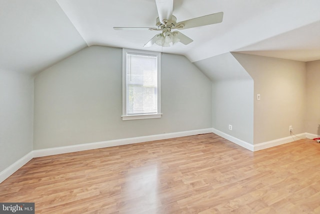 additional living space with ceiling fan, lofted ceiling, and light hardwood / wood-style floors