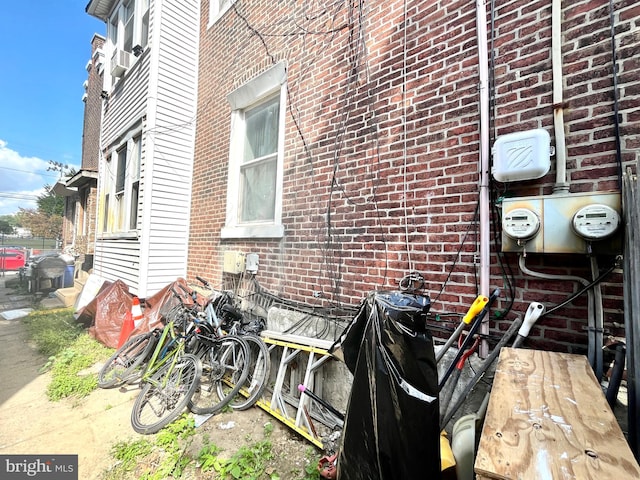 view of side of property with brick siding