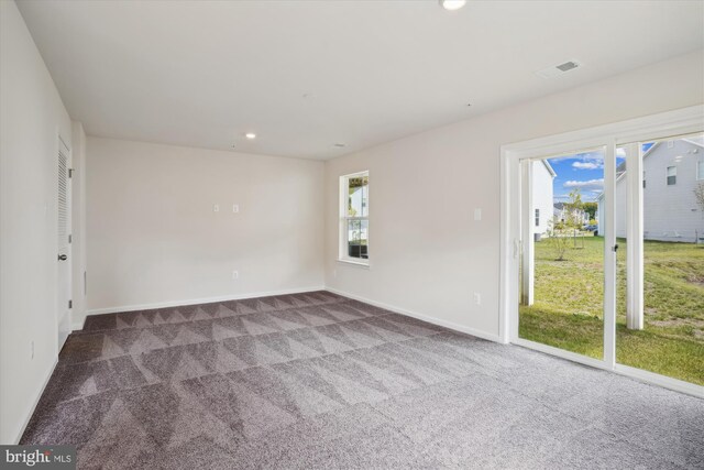 rear view of property with central AC unit, a deck, and a patio