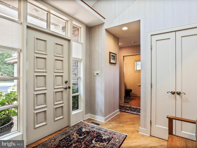 entryway with light hardwood / wood-style flooring