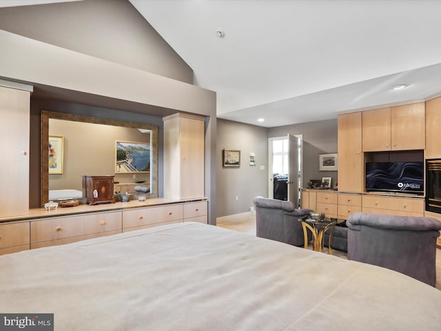 bedroom with lofted ceiling