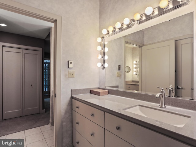 bathroom with vanity and tile patterned floors