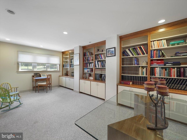 living area with carpet floors