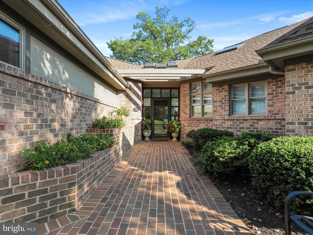 3596 Eagle Dr, Chambersburg, PA 17202 - property entrance featuring roof with shingles and brick siding