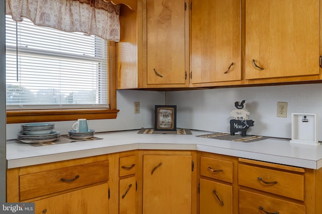 kitchen featuring light countertops