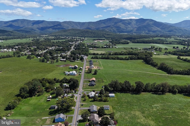 birds eye view of property with a rural view and a mountain view