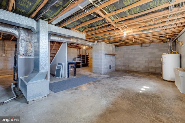 unfinished below grade area featuring stairs, heating unit, and water heater