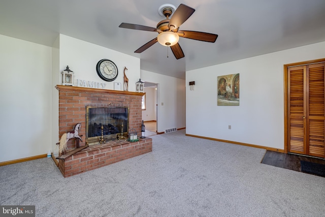 living room with a brick fireplace, visible vents, baseboards, and carpet floors