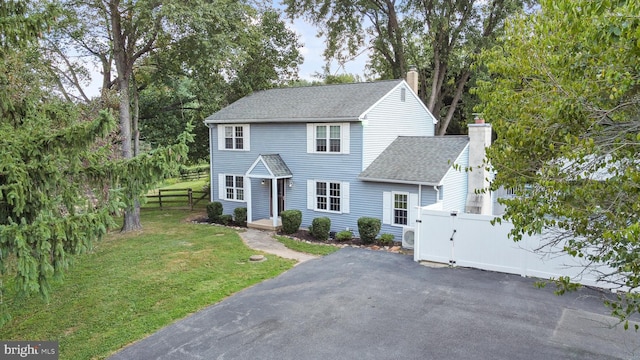 view of front of property with a front lawn